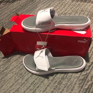 Size 7 white and silver Puma slide sandals